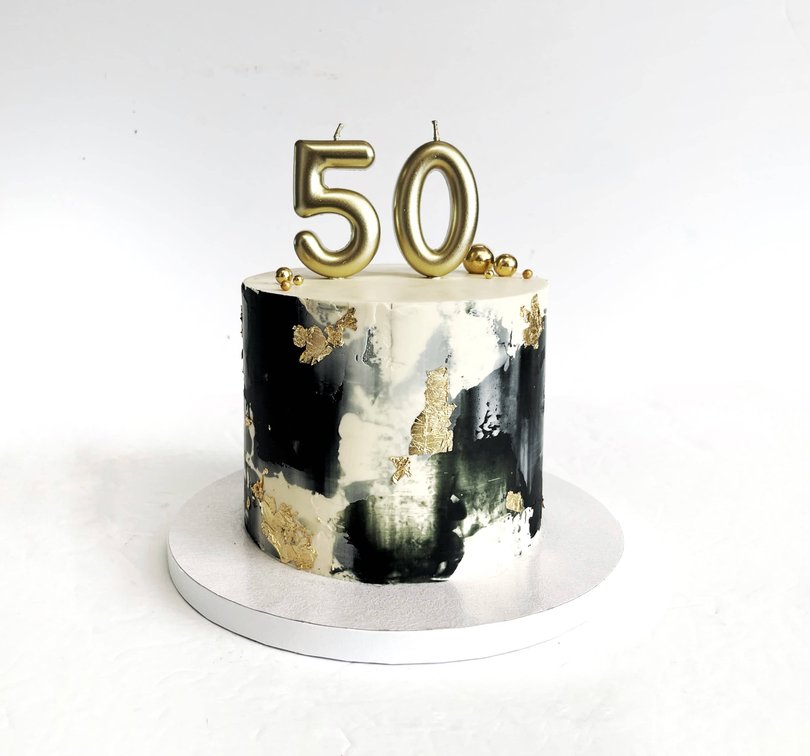 Colorful custom celebration cake by All Things Cake