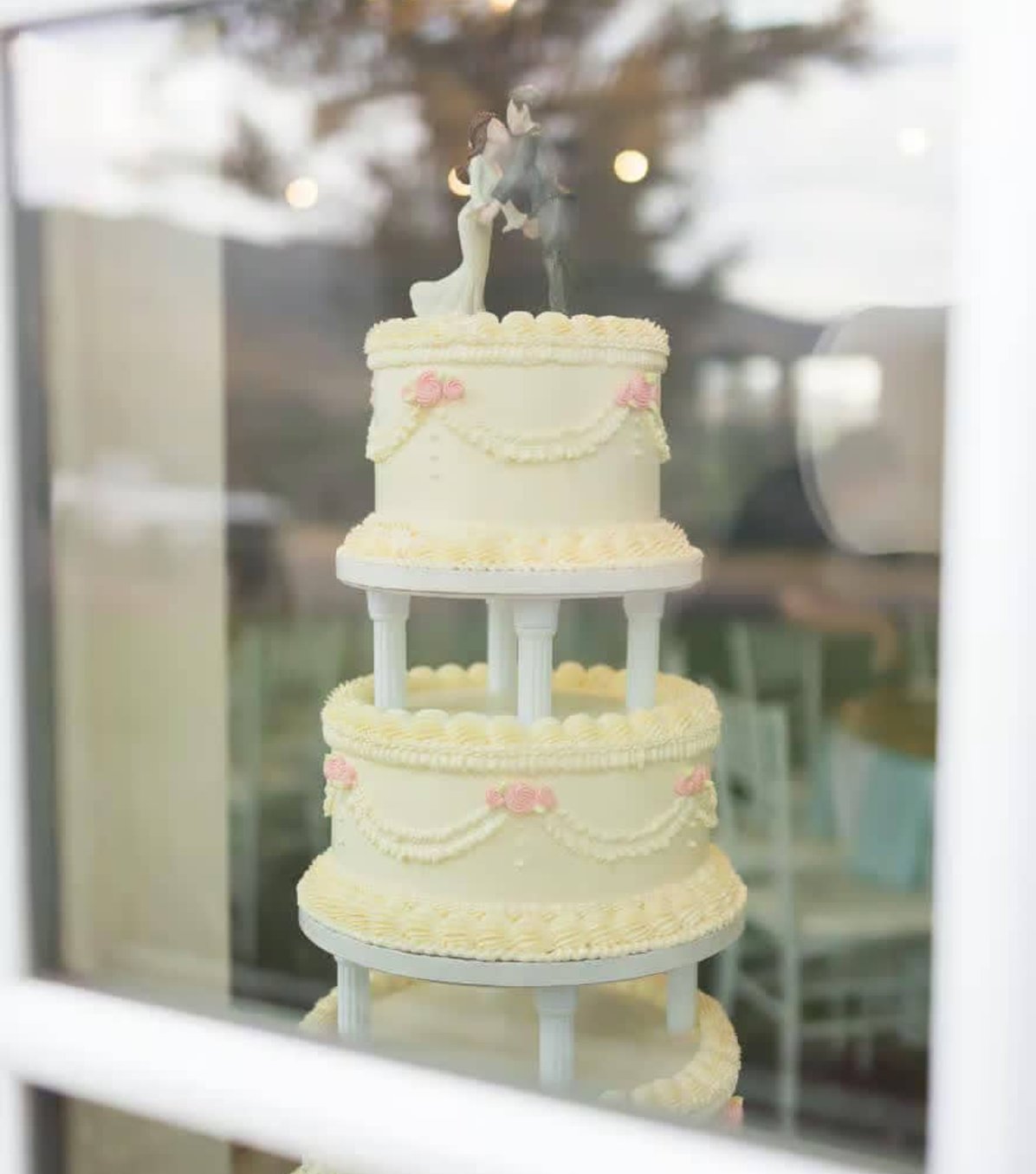 Wedding cake display image beside frequently asked questions