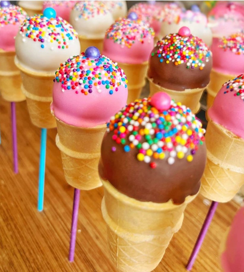 Decorated cake pops by All Things Cake